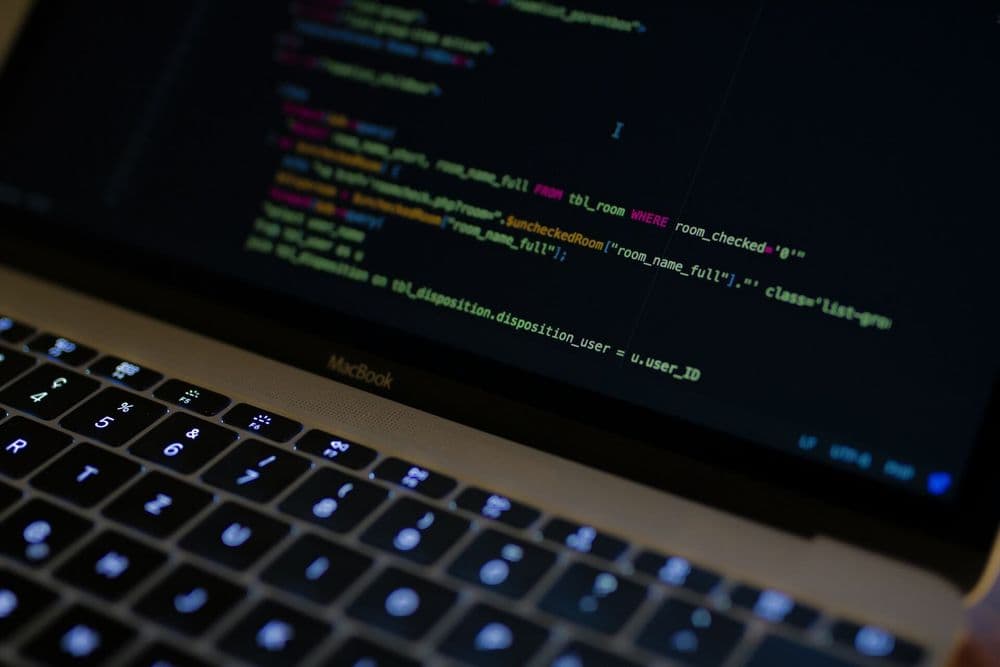 SQL code on computer screen: Implementing ASOF joins in Postgres and Timescale